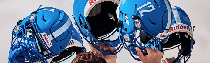 a group of people wearing helmets